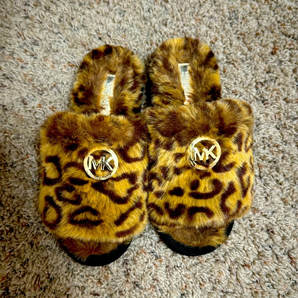 Micheal Kors slippers never worn, cheetah print
